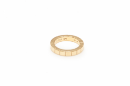 CARTIER - A GOLD MAILLON PANTHERE WEDDING RING