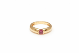 CARTIER - A GOLD AND RUBY BAND RING