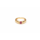 CARTIER - A GOLD AND RUBY BAND RING