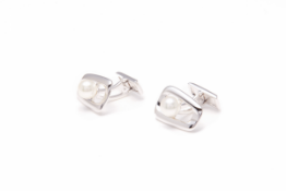 MIKIMOTO - A PAIR OF SILVER & PEARL CUFFLINKS