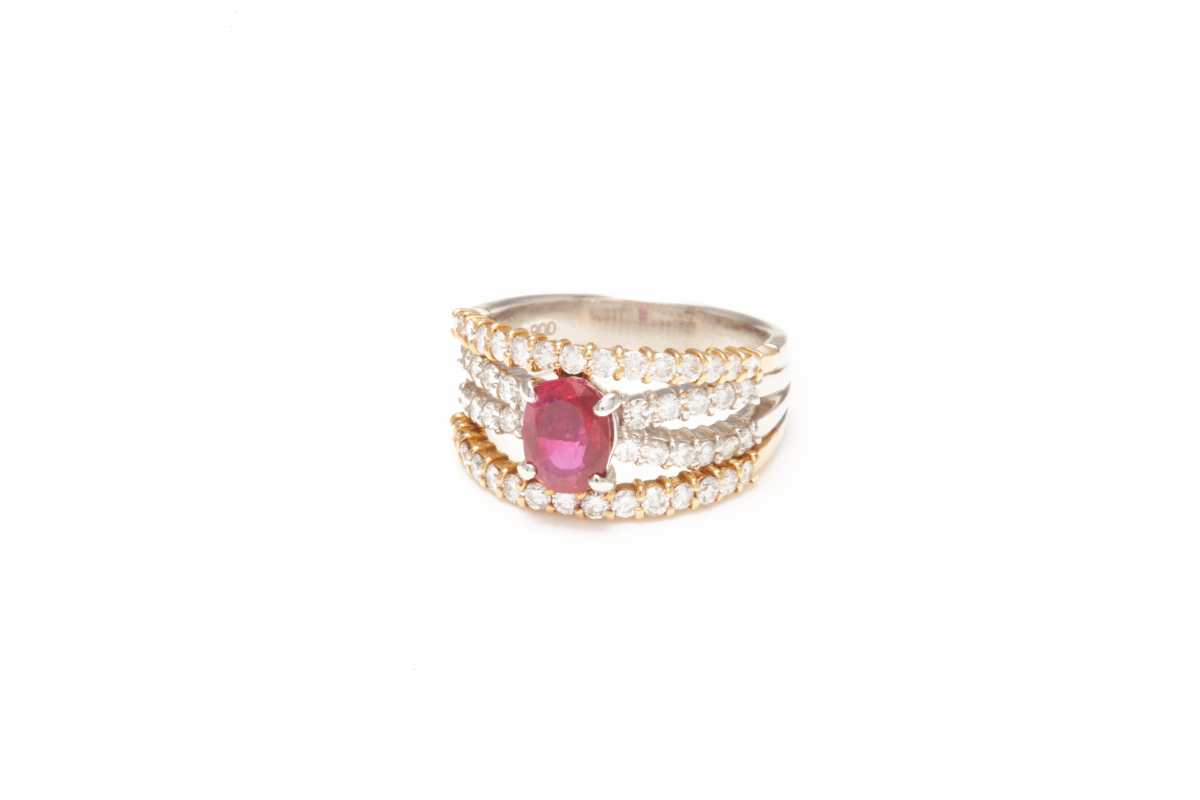 A PLATINUM, RUBY AND DIAMOND RING