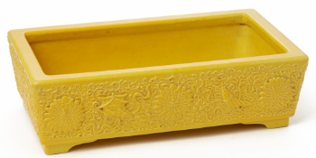 A YELLOW GLAZED RECTANGULAR 'JARDINIERE' OR NARCISSUS POT