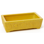 A YELLOW GLAZED RECTANGULAR 'JARDINIERE' OR NARCISSUS POT