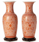 A PAIR OF LARGE IRON RED BALUSTER VASES
