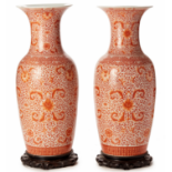 A PAIR OF LARGE IRON RED BALUSTER VASES