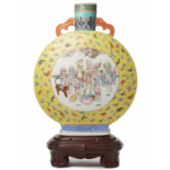 A LARGE YELLOW GROUND 'FAMILLE ROSE' MOON FLASK