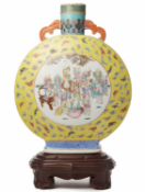 A LARGE YELLOW GROUND 'FAMILLE ROSE' MOON FLASK