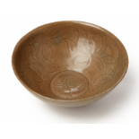 AN INCISED CELADON BOWL