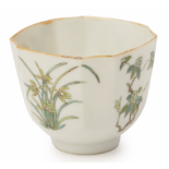 A PANELLED PORCELAIN TEA BOWL