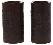 A PAIR OF CARVED BAMBOO BRUSH POTS