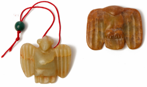 TWO SMALL HONGSHAN STYLE CARVED JADE PENDANTS