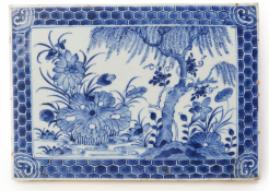 A BLUE AND WHITE RECTANGULAR PORCELAIN PLAQUE