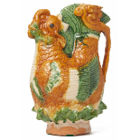 AN UNUSUAL 'SANCAI' GLAZED EWER