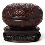 TWO CARVED TIXI LACQUER CIRCULAR BOXES AND COVERS