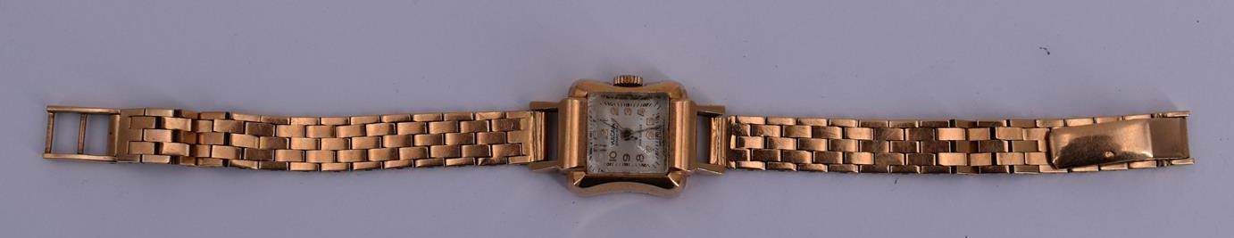 VULCAIN montre de dame en or sur bracelet or articulé. - Poids brut : 34,4 gr [...]