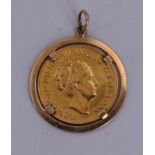 Pendentif en or serti d'une pièce de 10 Gulden Poids : 9 gr -