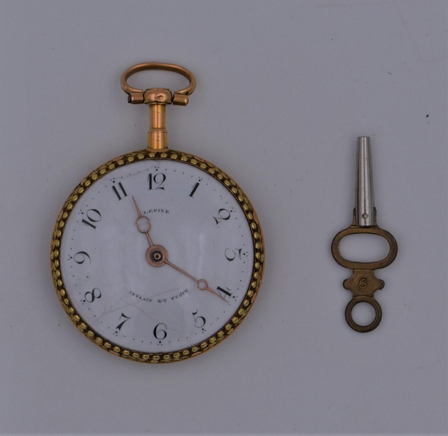 Petite montre en or d’époque Louis XVI, à décor de perlés et lauriers sur la [...]