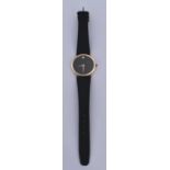 MOVADO, Montre mixte type Museum, cadran en or 14 carats, mouvement quartz. -