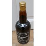 Bottle of Glen Elgin-Glenlivet 14 year old Pure Malt Scotch Whisky.