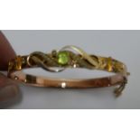 9 Karat Gold Peridot and Pearl Bangle - 10.8 grams.