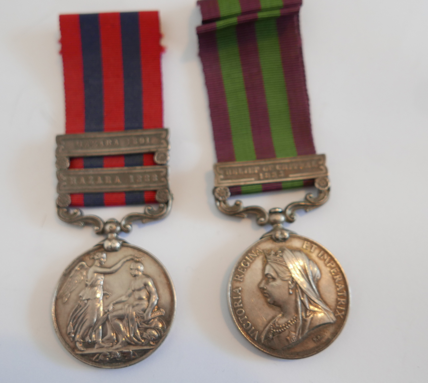 India 1854 General Service Medal - 2 Bars and Relief of Chitral 1895 Medal to Seaforth Highlanders.