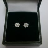 Pair of 9 karat Gold and Diamond Earrings - each earring approx 0.25 carat.