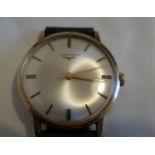 Vintage 9 karat Gold Gents Longines Watch in an working order.