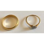 Lot of 18 karat Gold Ring and Yellow Metal Ring.