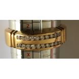 18 karat Gold Ring set with 20 diamonds - UK size Y 1/2 - total weight 9.35 grams.