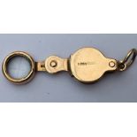 Miniature Gold Folding Magnifying Glass - 29mm with loop when closed - 3.2 grams weight.