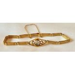 Edwardian yellow metal and diamond bracelet. Weight 10.6 Grams.