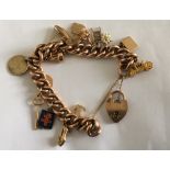 Vintage 9 karat Gold Charm Bracelet - total weight 43 grams.