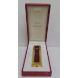 Cartier enamelled gold metal refillable purse spray, complete with original box and leather pouch