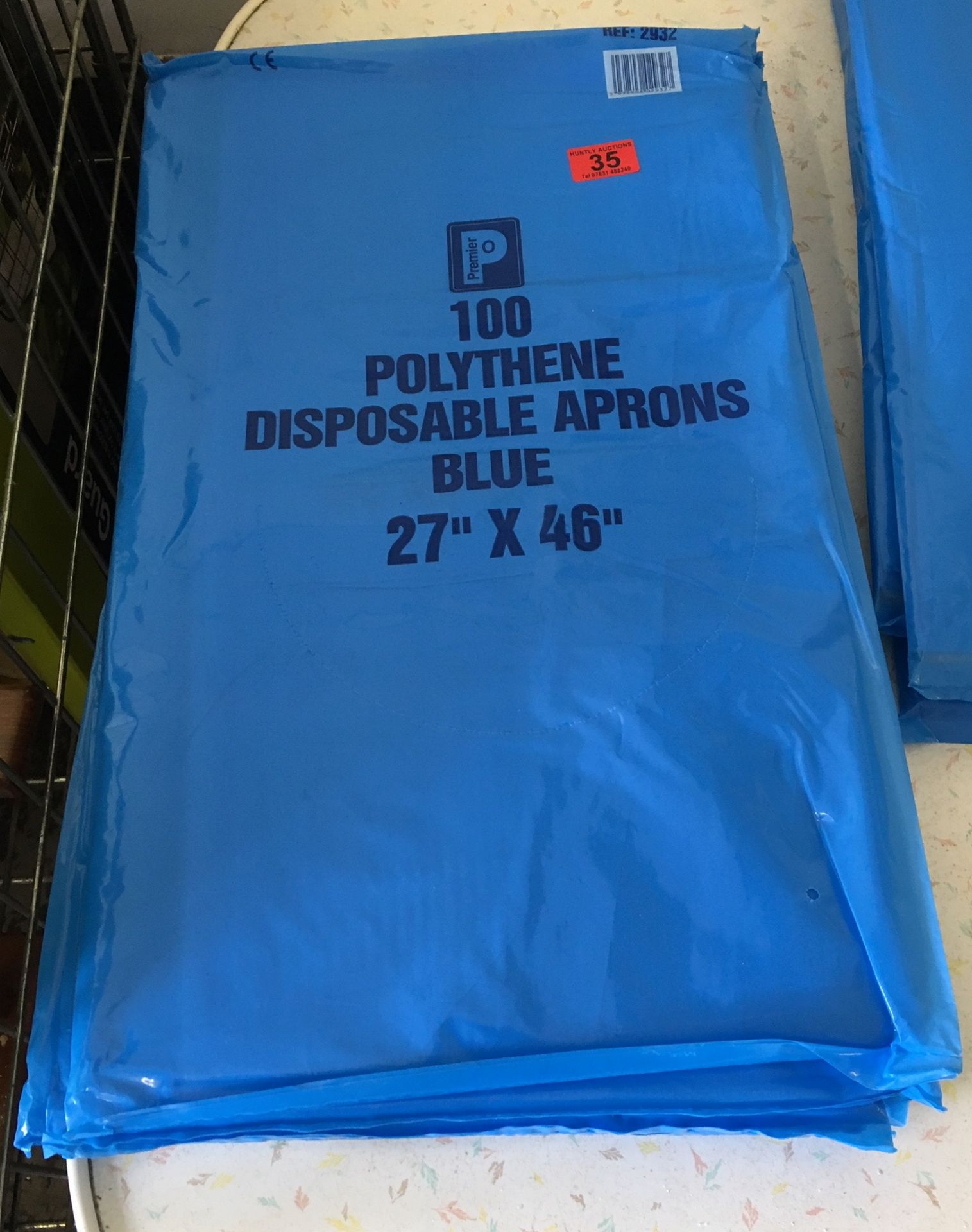 Lot of 5 Packs of Disposable Aprons approx 36" x 24" with 100 in each pack.