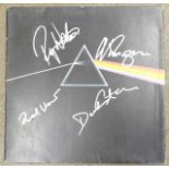 An autographed Pink Floyd LP record,