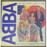 An autographed Abba 12" single,