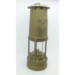 A miner's safety lamp, E. Thomas & Williams Ltd.