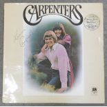 An autographed Carpenters LP record (Karen Carpenter only)