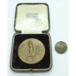 A golf related medallion and a hallmarked silver Yorkshire Ladies Golf brooch