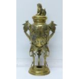 A brass centrepiece with lid,