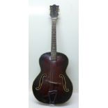 An acoustic jazz guitar,