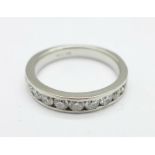 An 18ct white gold and diamond ¾ eternity ring, approximately 1.