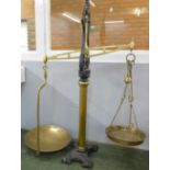 A pair of brass and iron balance scales