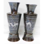 A pair of metal vases with Egyptian decoration, 15.