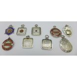 Nine silver cycling fobs including Lancashire Road Club and Manchester Clarion and with