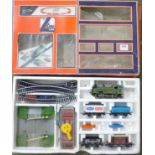 A Lima Level Crossing Freight Train set with controller,