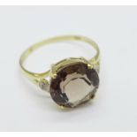 A 9ct gold and smoky quartz ring, 1.