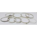 A collection of silver bangles,