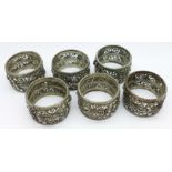 A set of six eastern white metal napkin rings