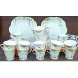 A twelve setting Art Deco tea service, Collingwood Bone China, England,